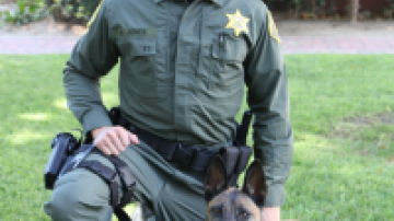 Orange County officer Austin and narcotic K-9 Luna