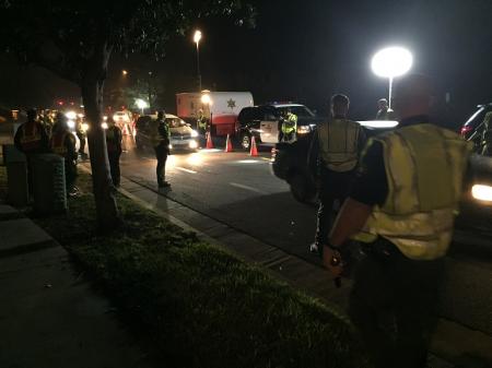 Orange County officers stopping cars at DUI checkpoint