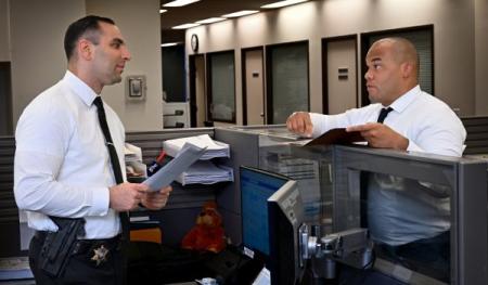 Photo of investigators talking